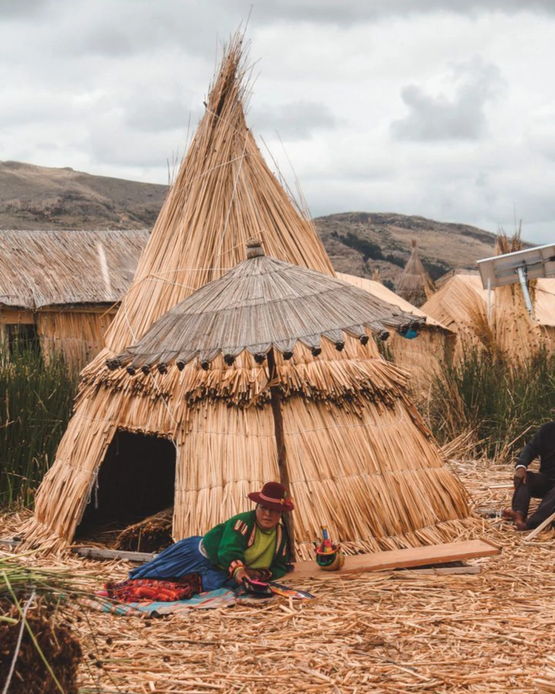 Woman looking over the vast Titicaca lake